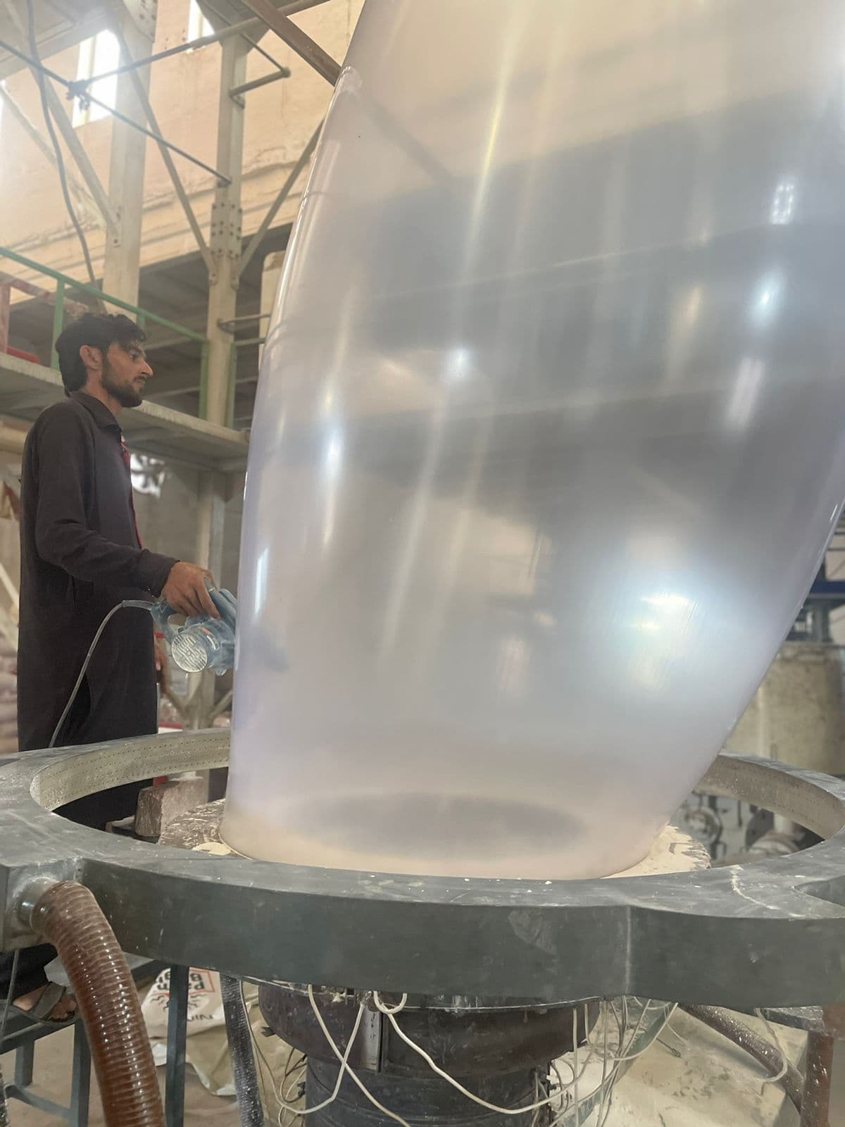 Operator at the blown film line in Multan