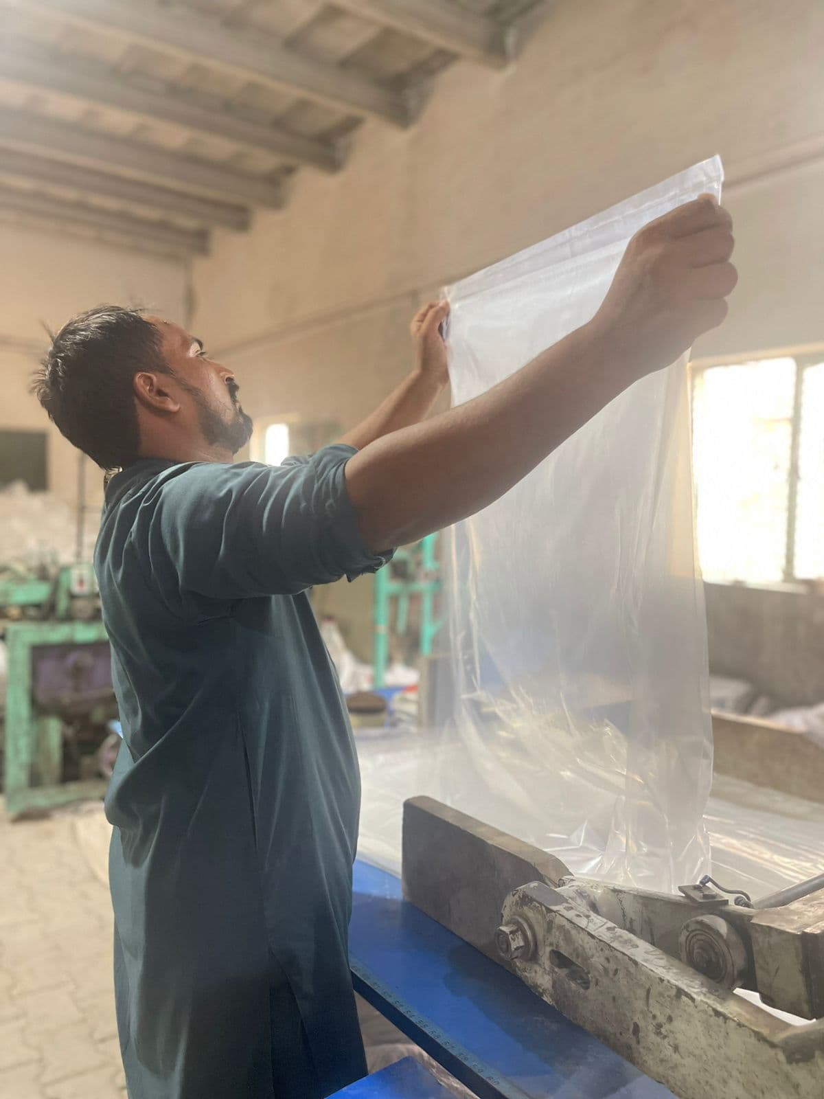 Checking a finished polyethylene sheet on the line